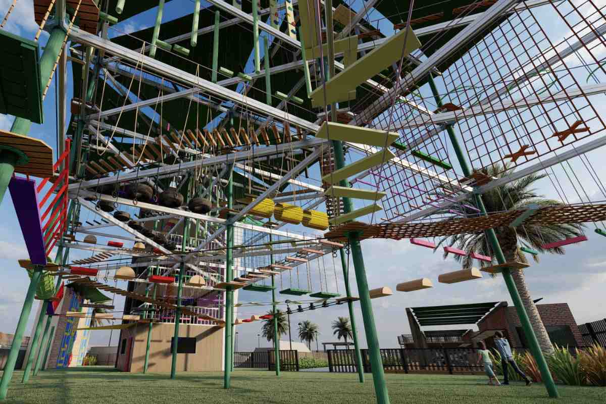 Hanging rope obstacles and high-ground adventure park setup at the Resort Adventure Playground, designed for challenging physical activities and team-building experiences for kids.